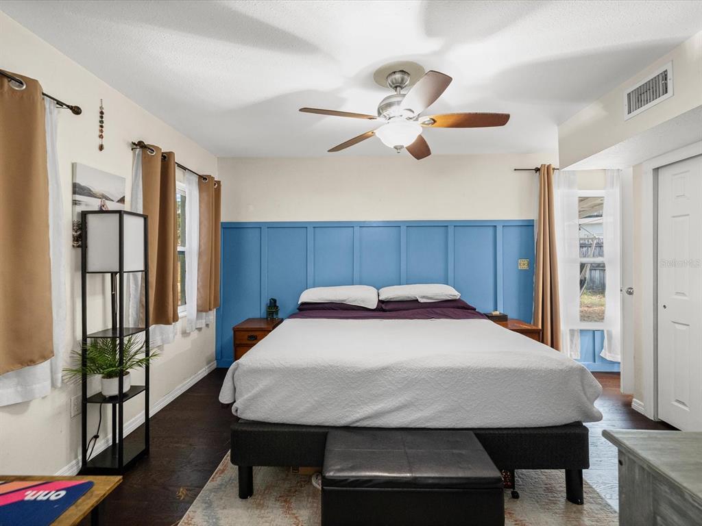 7114 Carlow Street New Port Richey, FL 34653 - Photo 17 of 65 a kitchen with stainless steel appliances a table chairs and a refrigerator