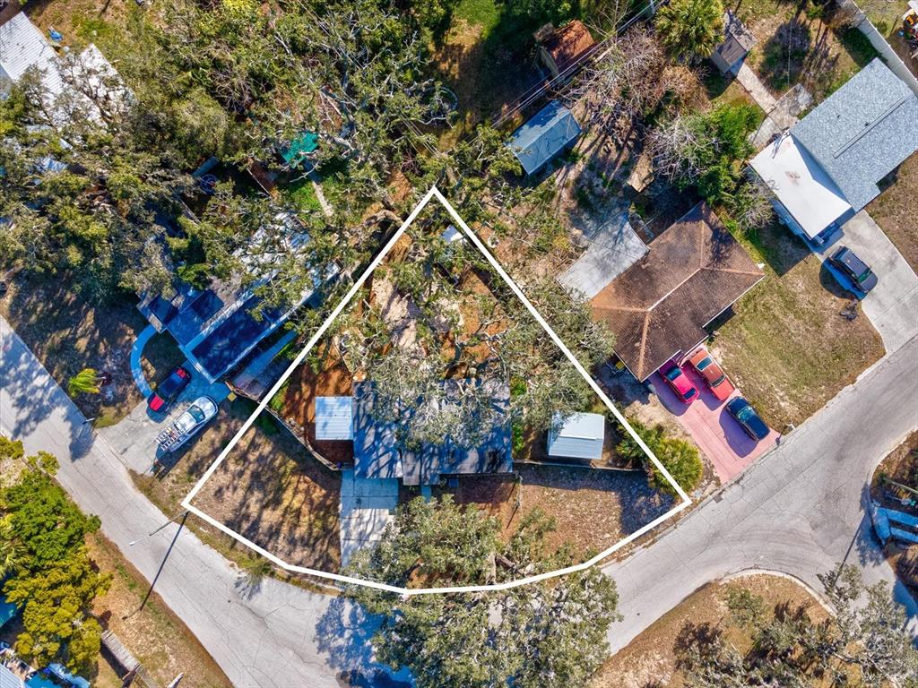 7114 Carlow Street New Port Richey, FL 34653 - Photo 36 of 65 an aerial view of a house with swimming pool and outdoor space