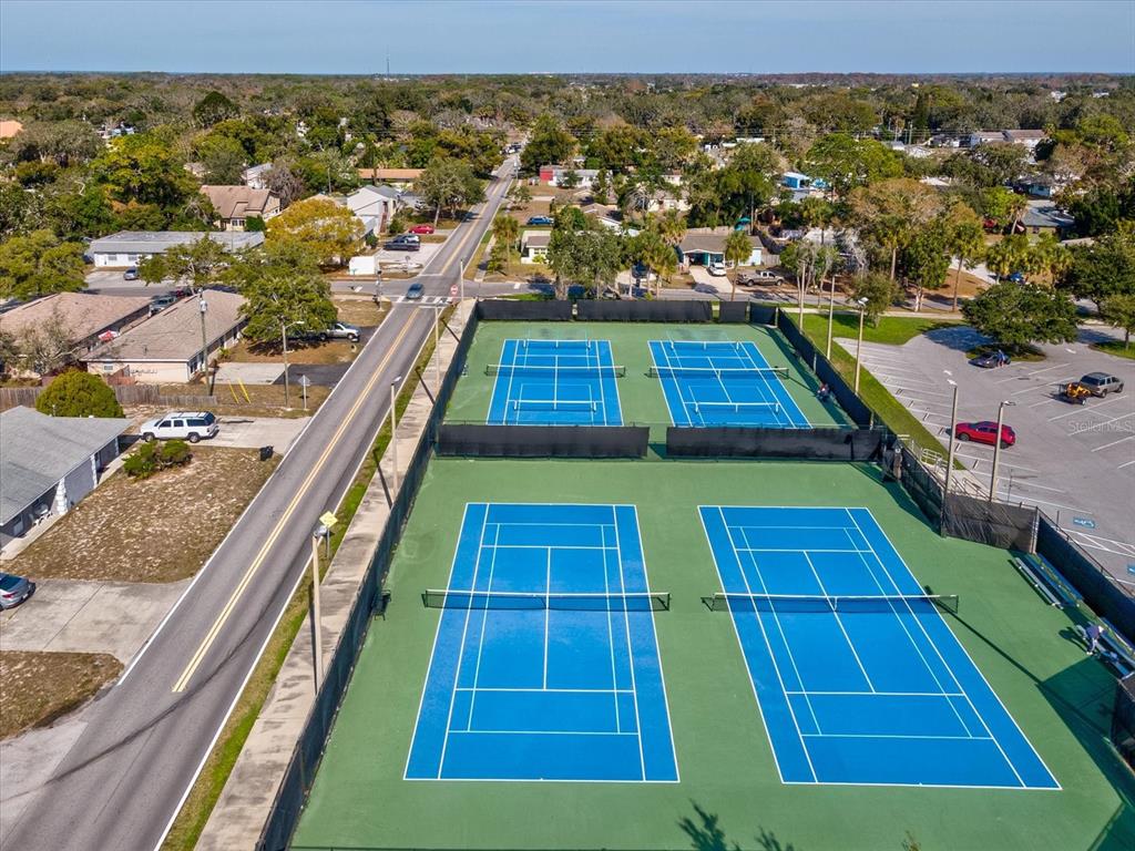 7114 Carlow Street New Port Richey, FL 34653 - Photo 54 of 65 an aerial view of tennis court