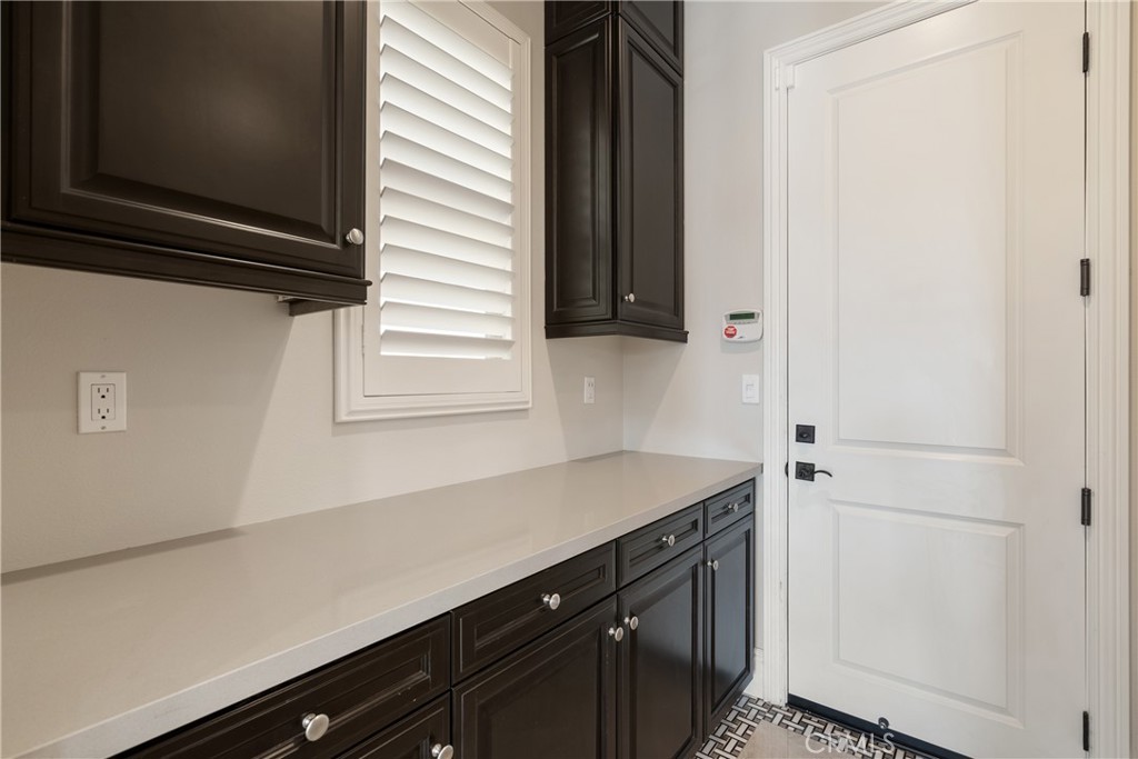 2498 Santa Paula Drive Brea, CA 92821 - Photo 32 of 75 a kitchen with a sink and cabinets