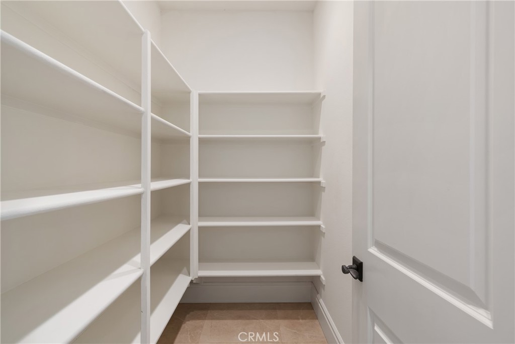 2498 Santa Paula Drive Brea, CA 92821 - Photo 33 of 75 a view of walk in closet with empty racks