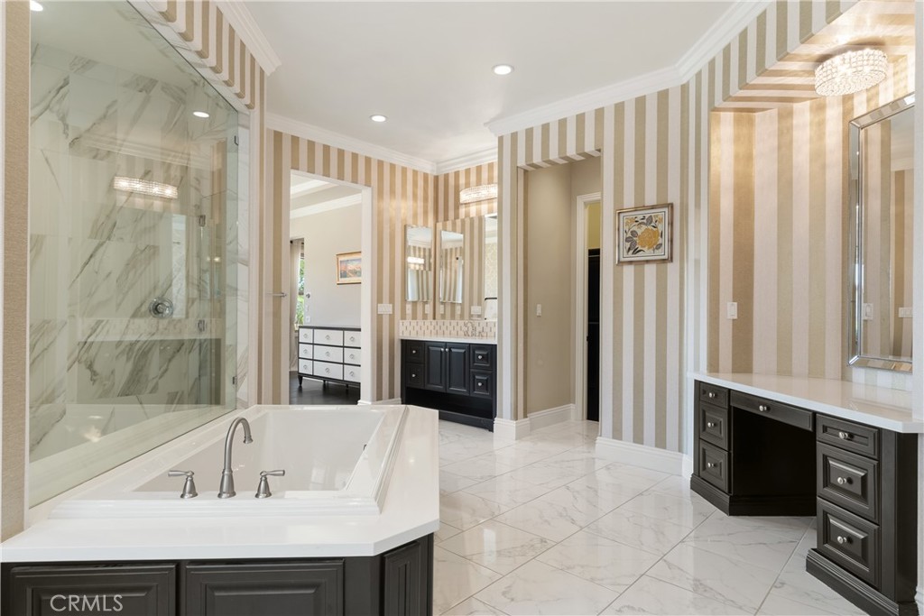 2498 Santa Paula Drive Brea, CA 92821 - Photo 45 of 75 a spacious bathroom with a tub shower and sink