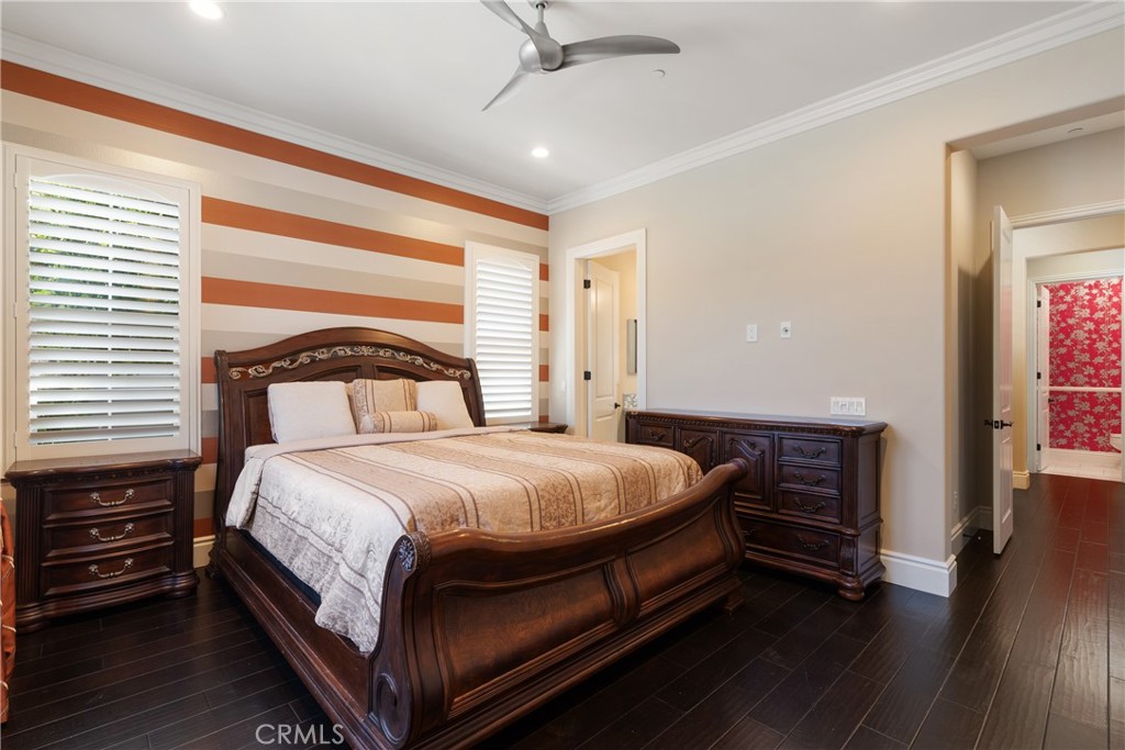 2498 Santa Paula Drive Brea, CA 92821 - Photo 49 of 75 a bedroom with a bed and a ceiling fan