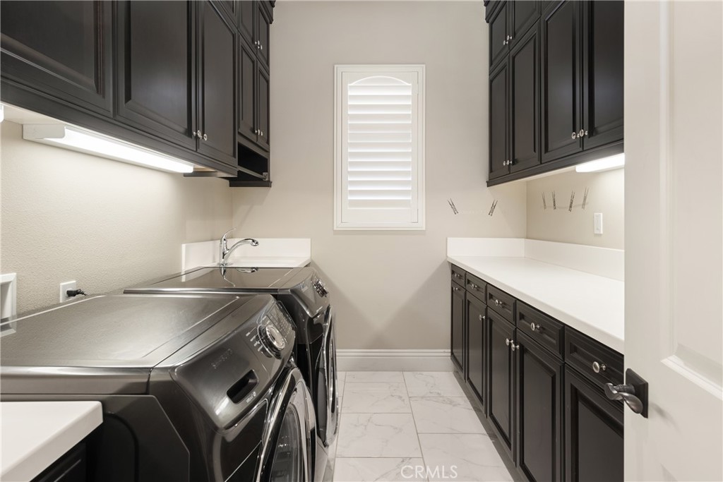 2498 Santa Paula Drive Brea, CA 92821 - Photo 53 of 75 a kitchen with a sink cabinets and a window
