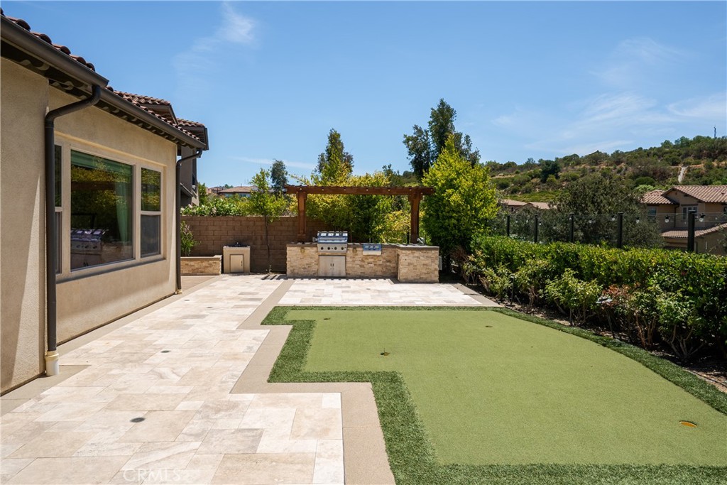 2498 Santa Paula Drive Brea, CA 92821 - Photo 71 of 75 a view of a swimming pool with a patio