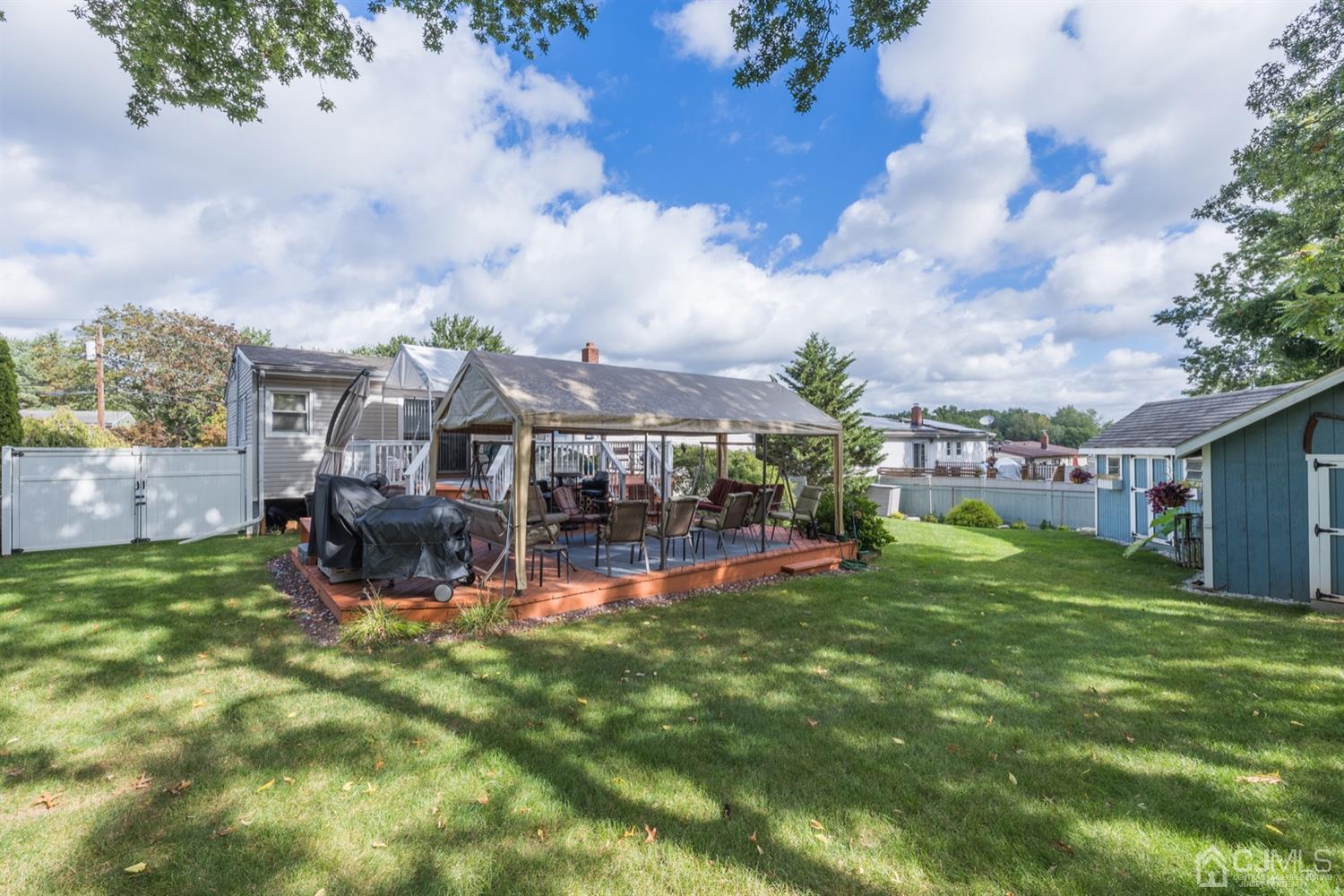 8 Wilk Road Edison, NJ 08837 - Photo 20 of 20 a view of a house with a big yard and sitting area