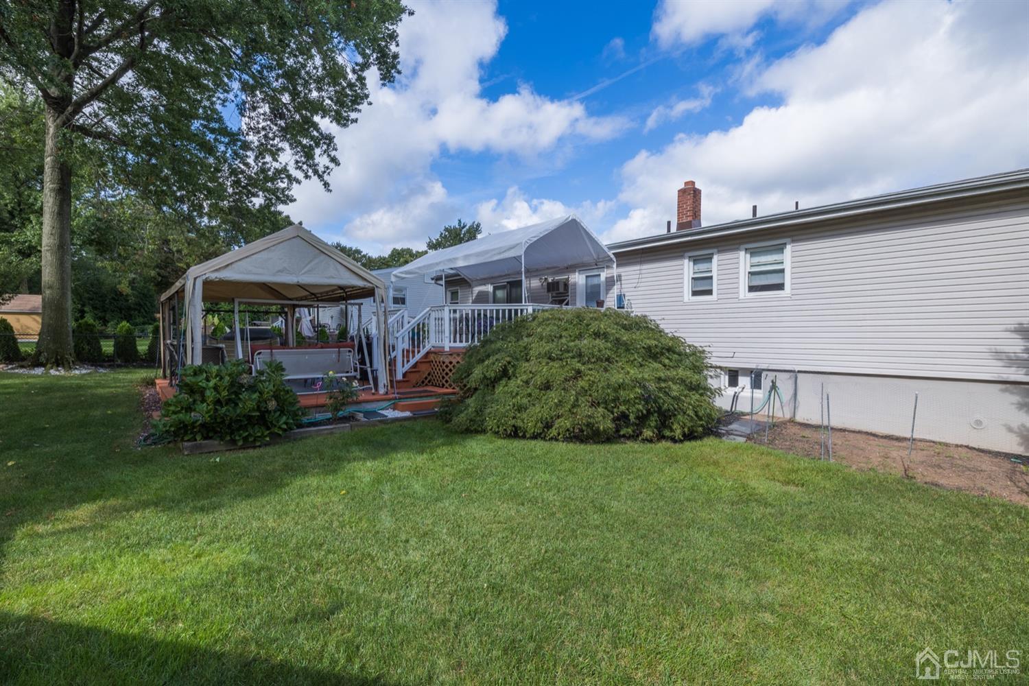 8 Wilk Road Edison, NJ 08837 - Photo 3 of 20 a view of a yard in front of house