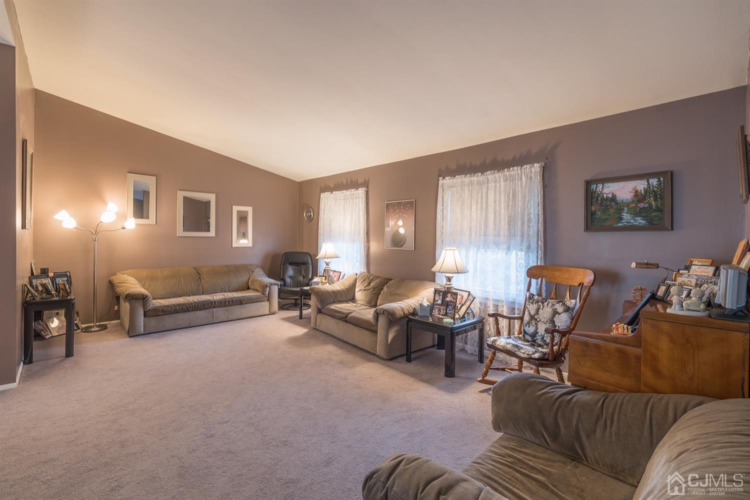 8 Wilk Road Edison, NJ 08837 - Photo 6 of 20 a living room with furniture and a window