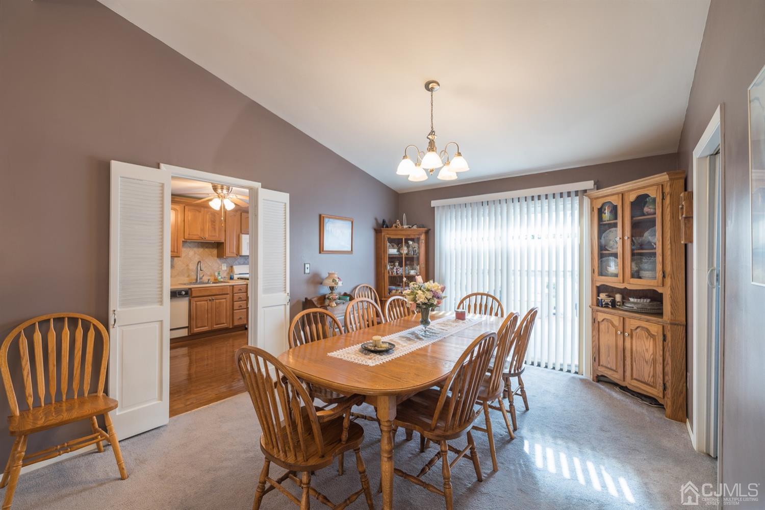 8 Wilk Road Edison, NJ 08837 - Photo 8 of 20 a view of a dining room with furniture window and wooden floor