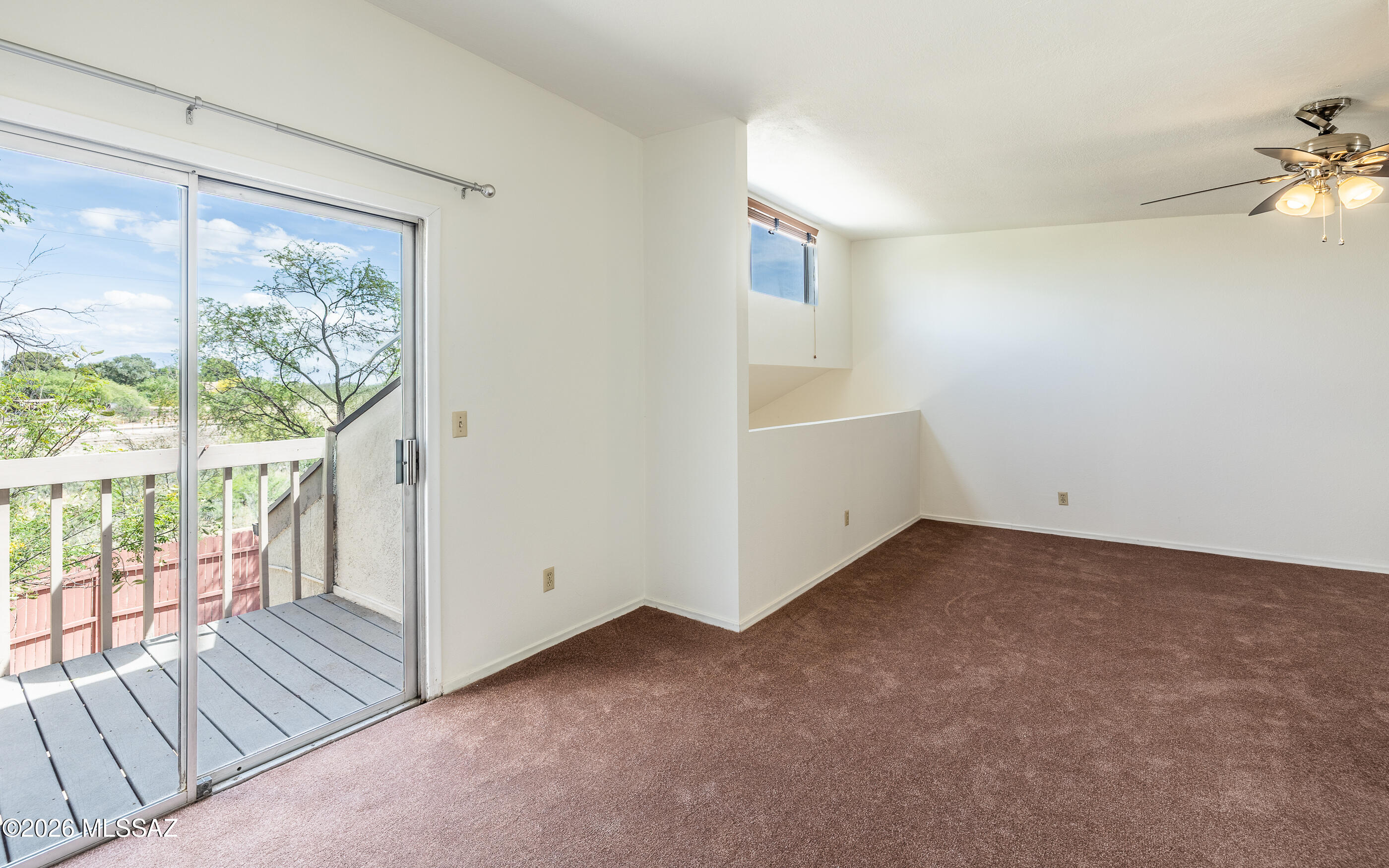 3750 North Country Club Road, Unit 46 Tucson, AZ 85716 - Photo 22 of 34 a view of a room with wooden floor and windows