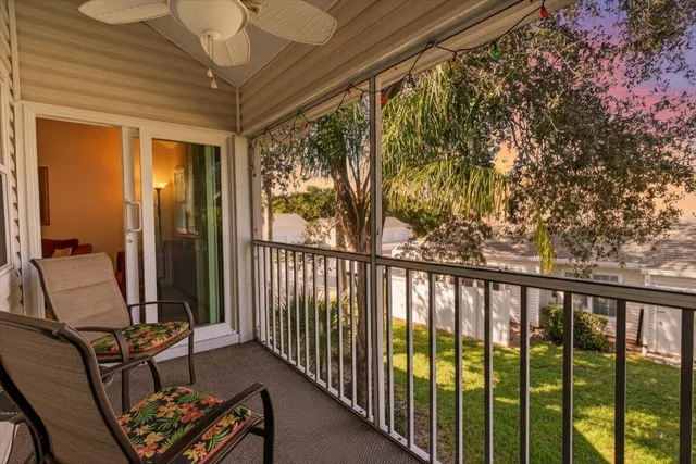 a view of a balcony with chair