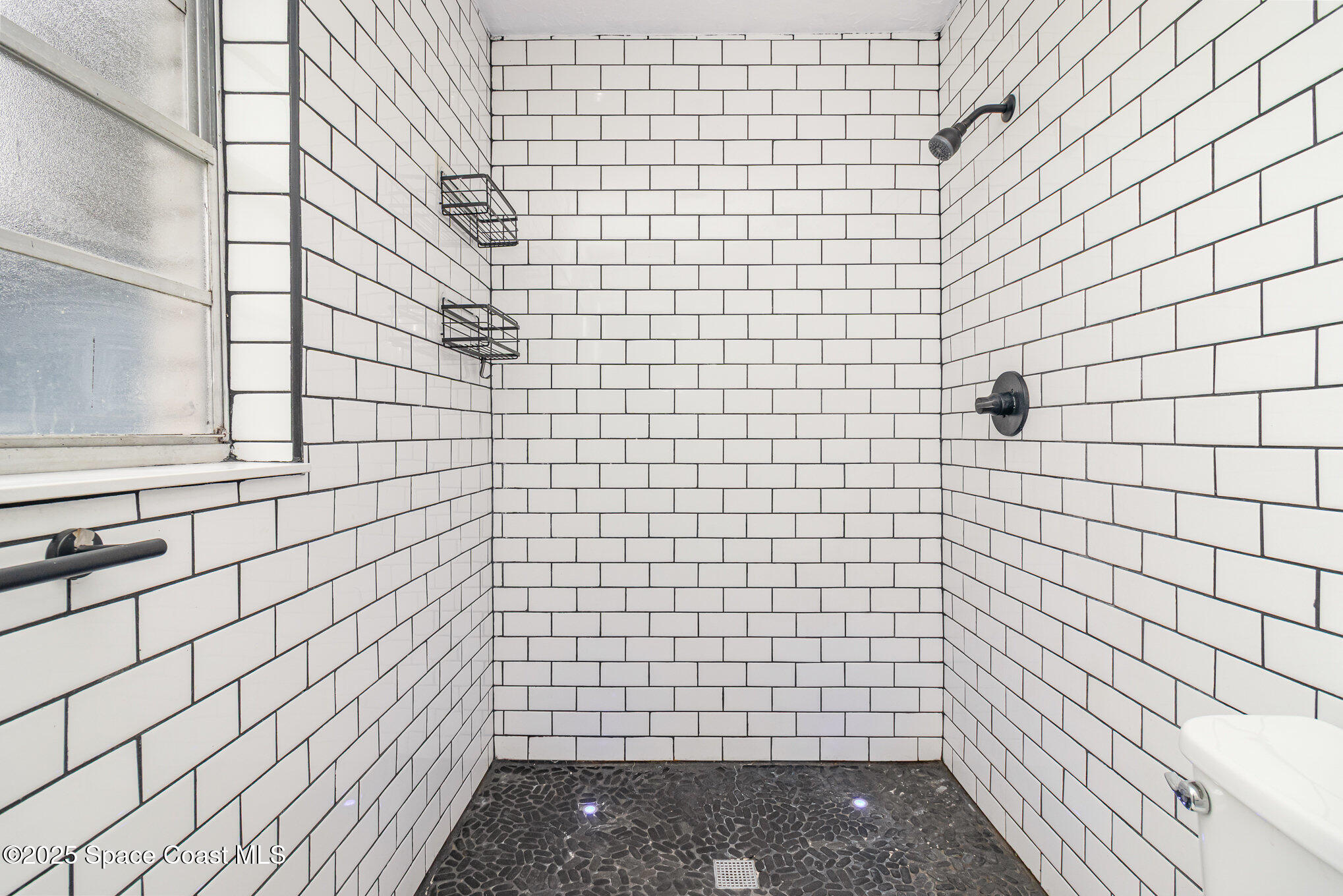 13 Scott Lane Rockledge, FL 32955 - Photo 14 of 26 a bathroom with a shower