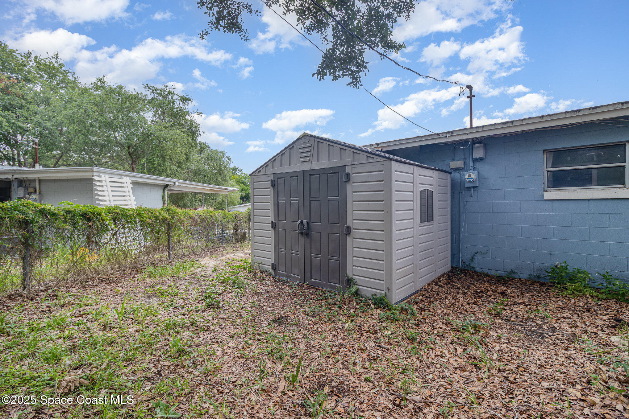 13 Scott Lane Rockledge, FL 32955 - Photo 22 of 26 a view of a house with a yard