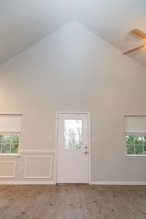 7311 Farm To Market Road 1886, Unit 101 Azle, TX 76020 - Photo 9 of 37 an empty room with windows