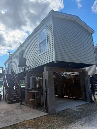 $120,000 | 813 Hwy 364, Unit 65, Harpers Ferry, IA 52146