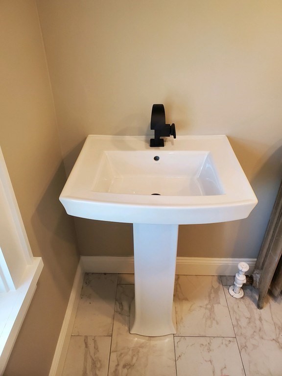 22 Allen Street, Unit 2 Arlington, MA 02474 - Photo 18 of 25 a close view of tap