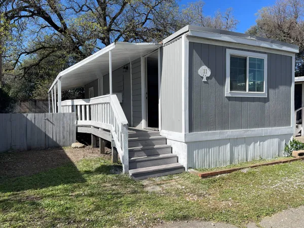 a view of backyard with deck