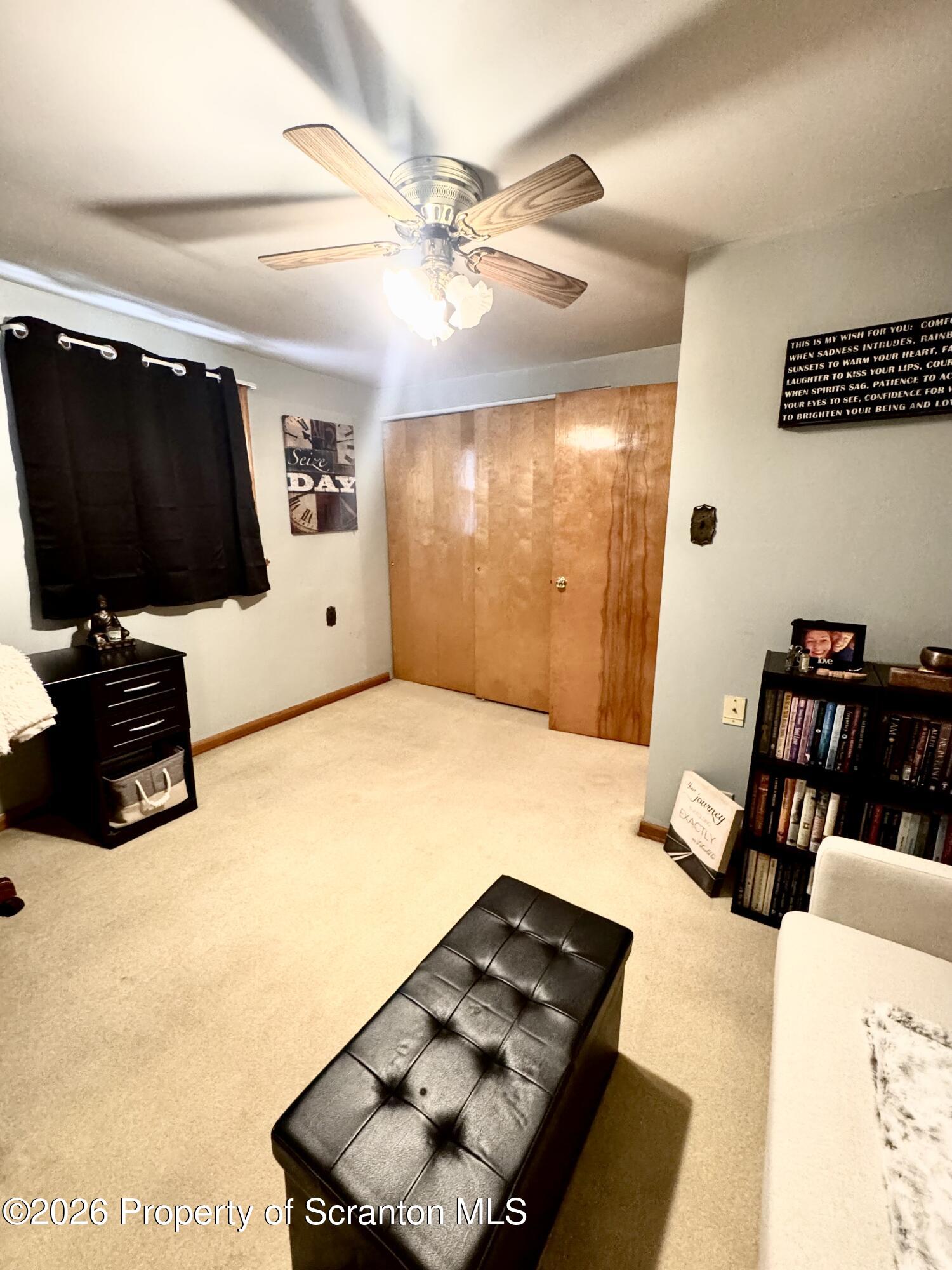 420 Delaware Street Jermyn, PA 18433 - Photo 13 of 22 a living room with furniture and a flat screen tv