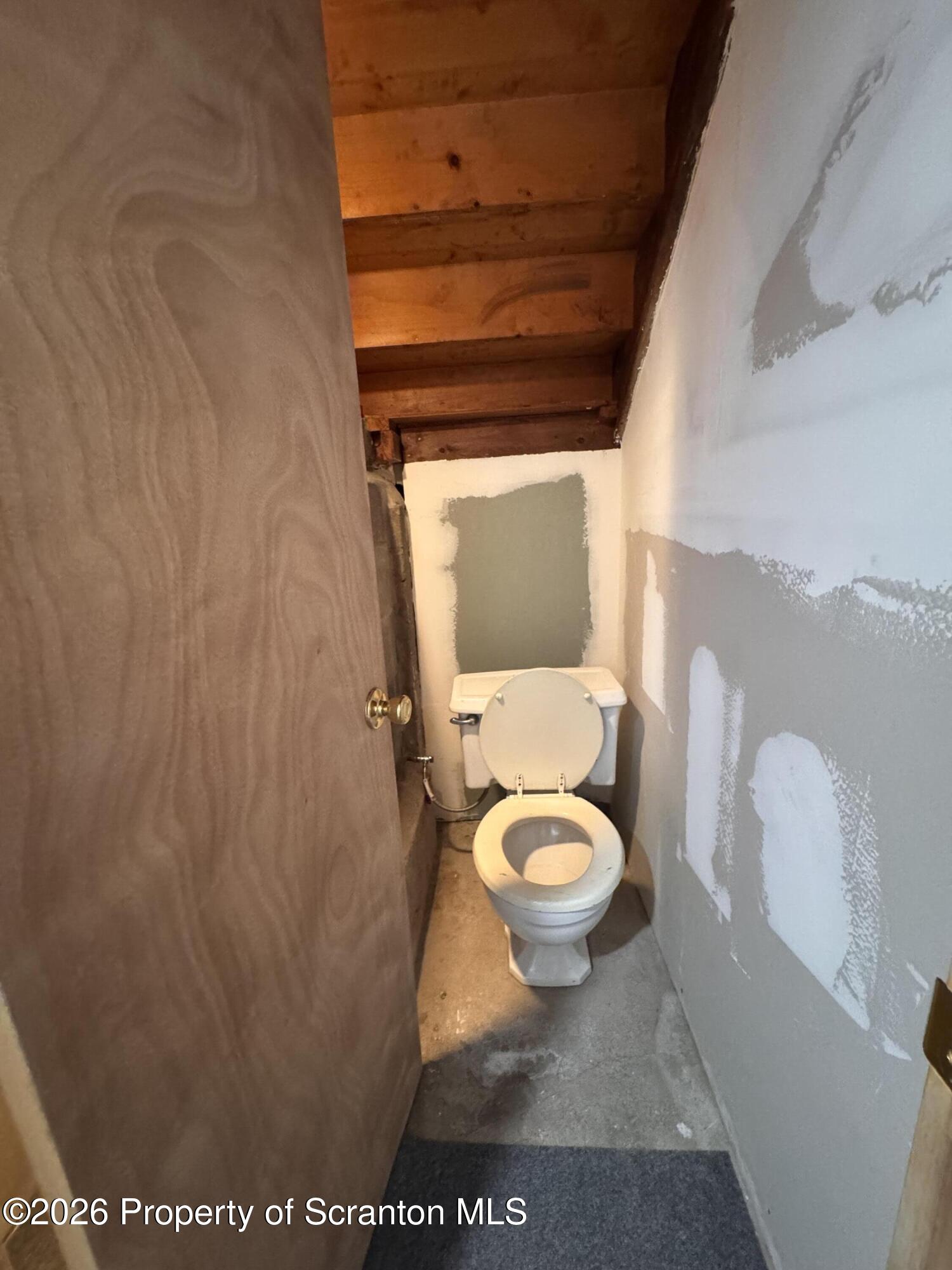 420 Delaware Street Jermyn, PA 18433 - Photo 20 of 22 a bathroom with a toilet and a vanity