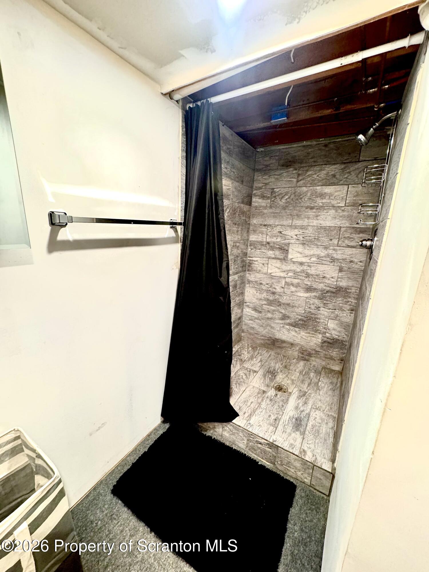 420 Delaware Street Jermyn, PA 18433 - Photo 21 of 22 a view of water heater room