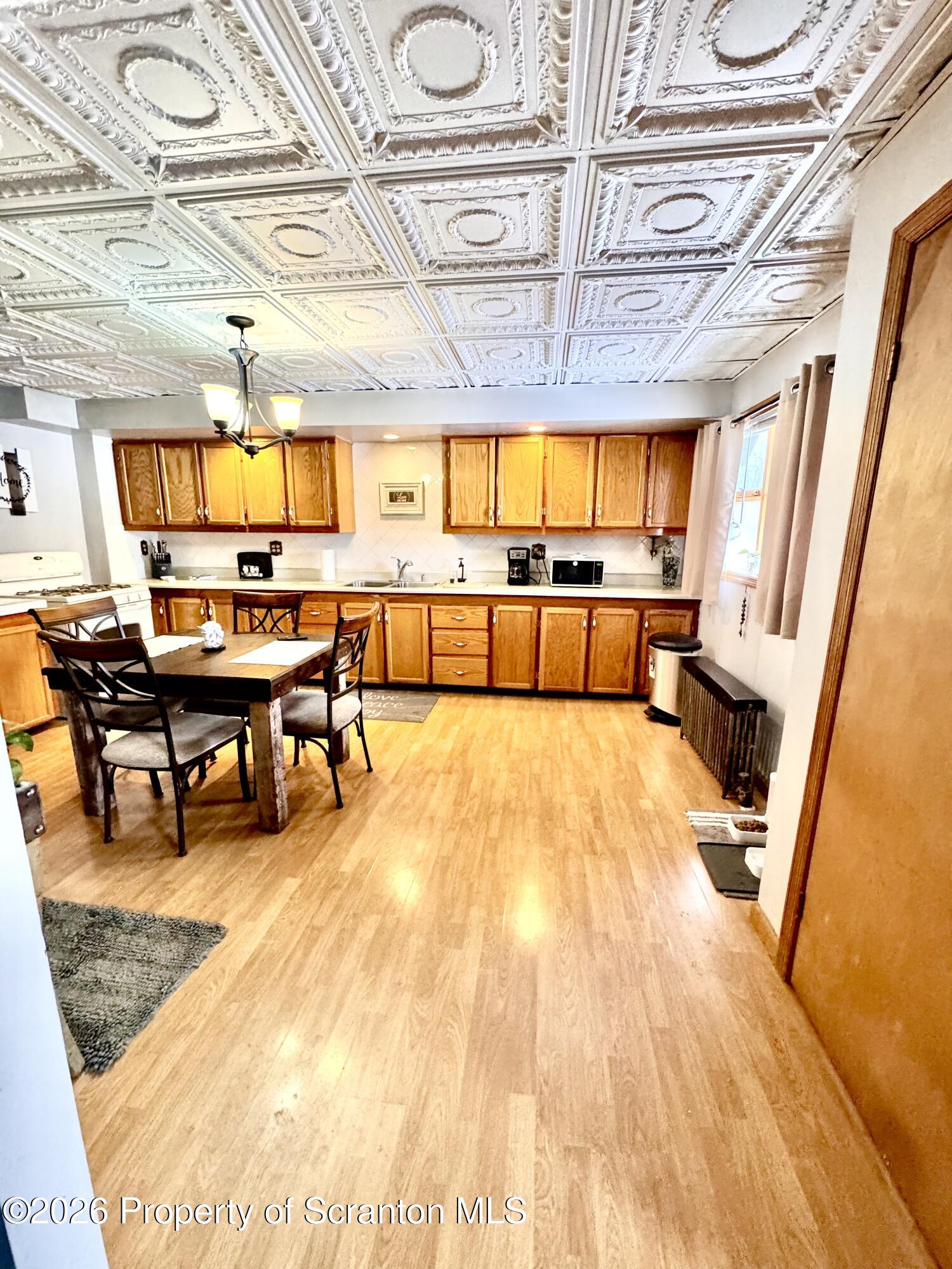 420 Delaware Street Jermyn, PA 18433 - Photo 5 of 22 a living room with a rug