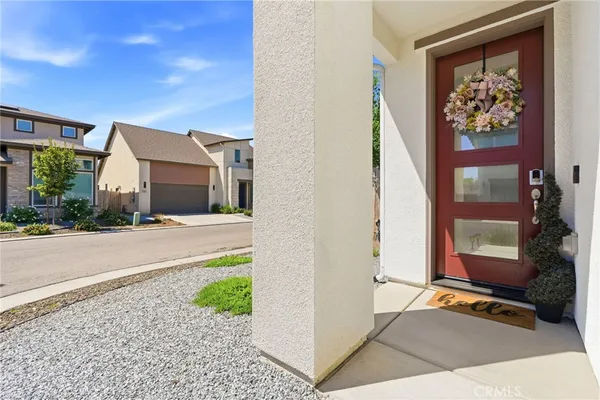 a kitchen with stainless steel appliances granite countertop a sink and a microwave