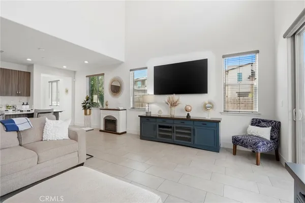 a kitchen with stainless steel appliances granite countertop a stove microwave and sink