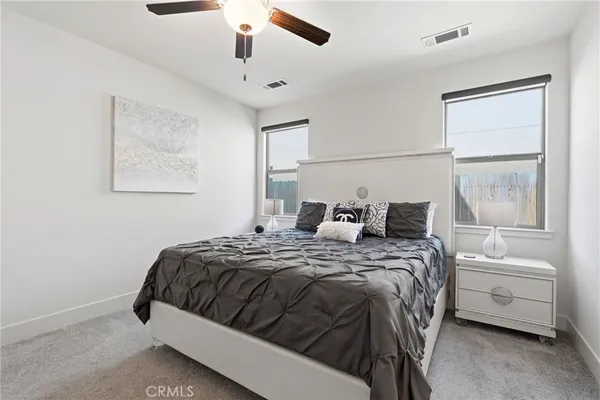 a workspace with furniture and kitchen view