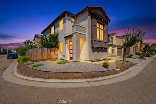 a view of a house with entertaining space