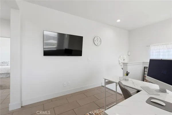 an aerial view of a city with lawn chairs