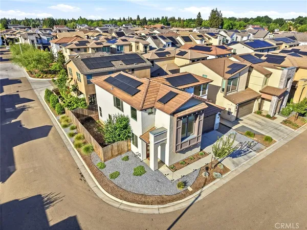 an aerial view of residential building with parking space