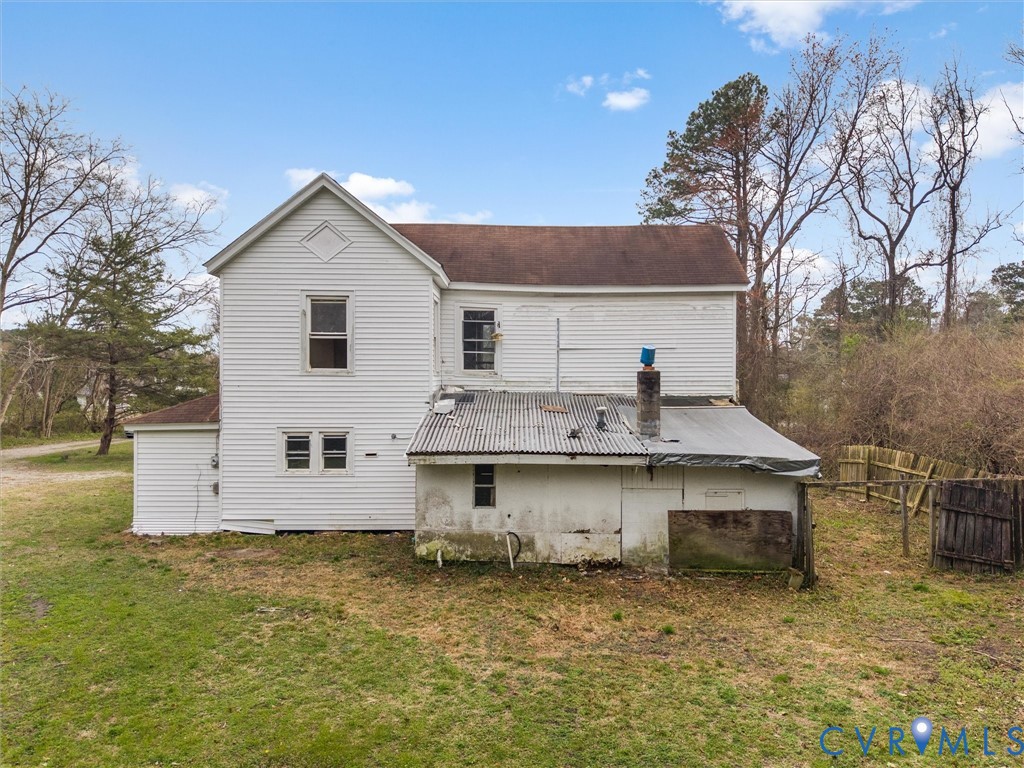 8571 Guinea Road Hayes, VA 23072 - Photo 33 of 45 front view of a house with a yard