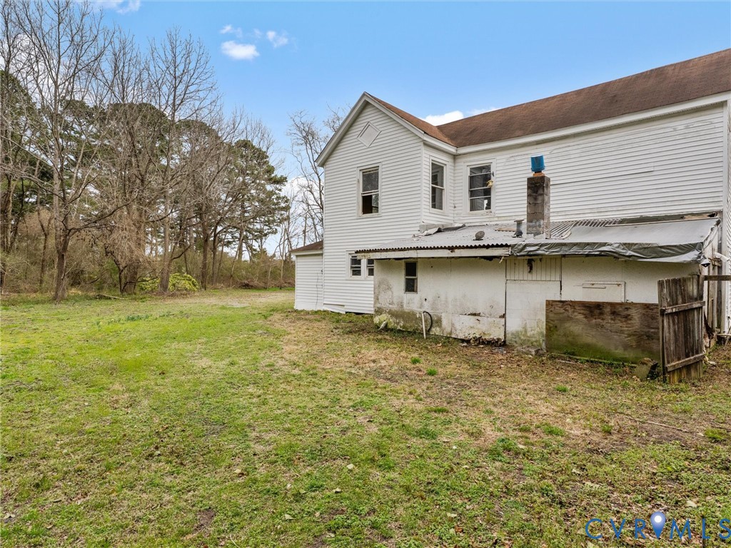 8571 Guinea Road Hayes, VA 23072 - Photo 35 of 45 a view of a house with a yard