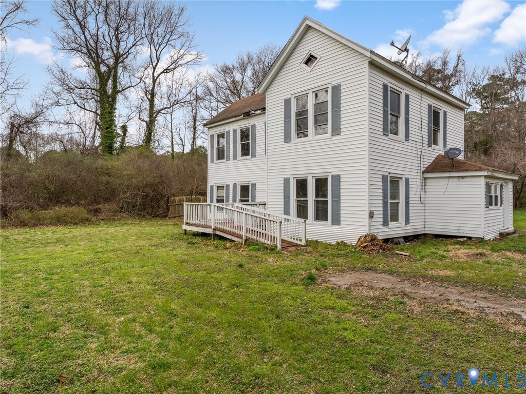 8571 Guinea Road Hayes, VA 23072 - Photo 41 of 45 a front view of a house with a garden