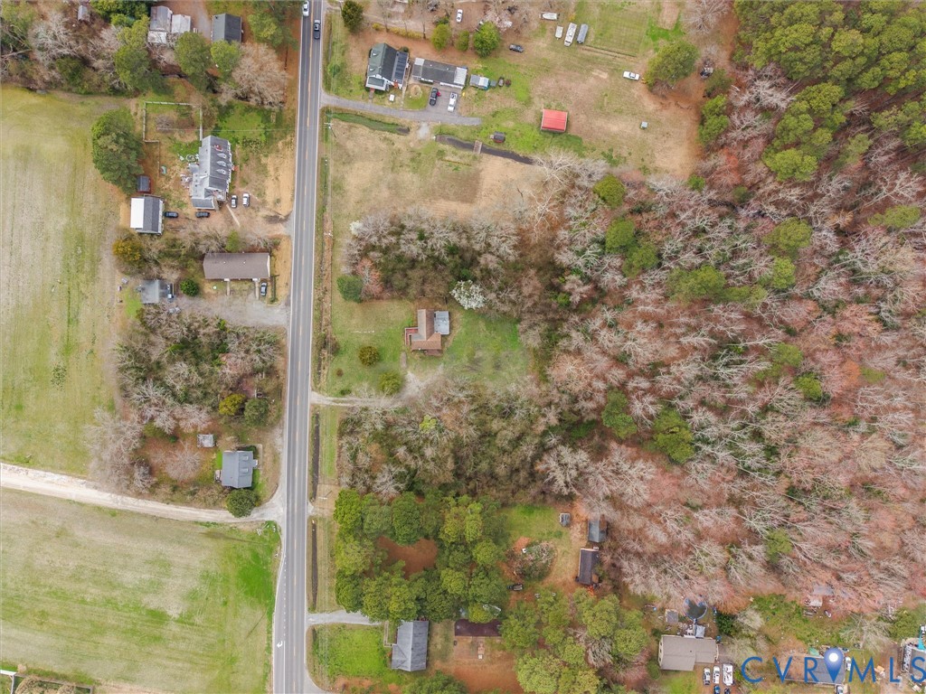8571 Guinea Road Hayes, VA 23072 - Photo 44 of 45 a view of a glass door with a lake view
