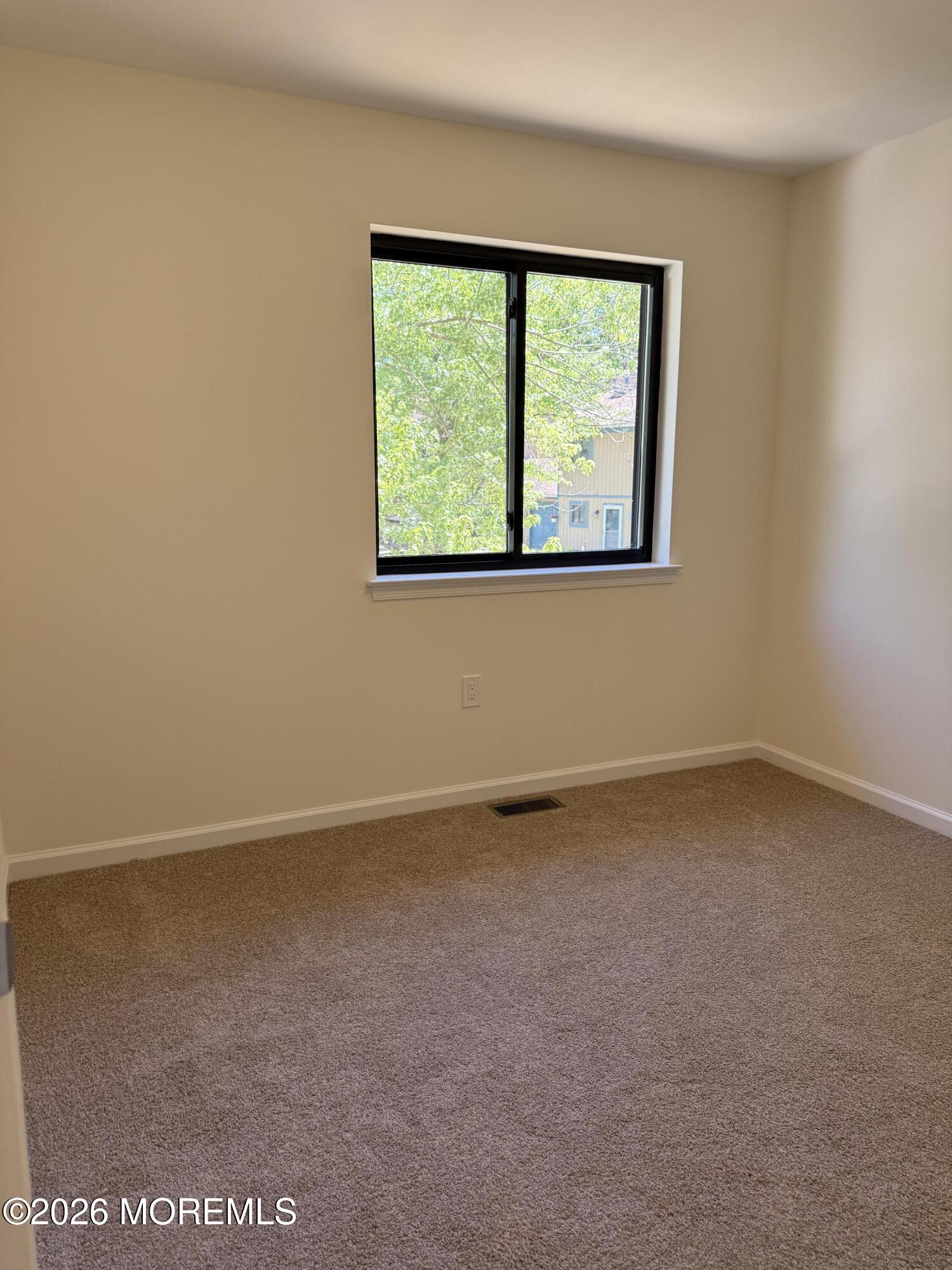 5 Canary Circle Howell, NJ 07731 - Photo 19 of 32 an empty room with a window