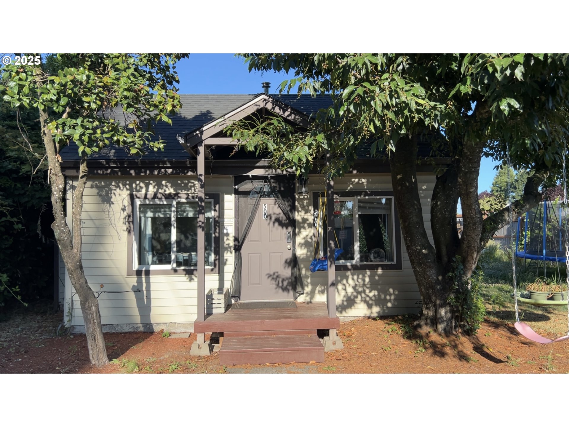 a black and white photo of a house