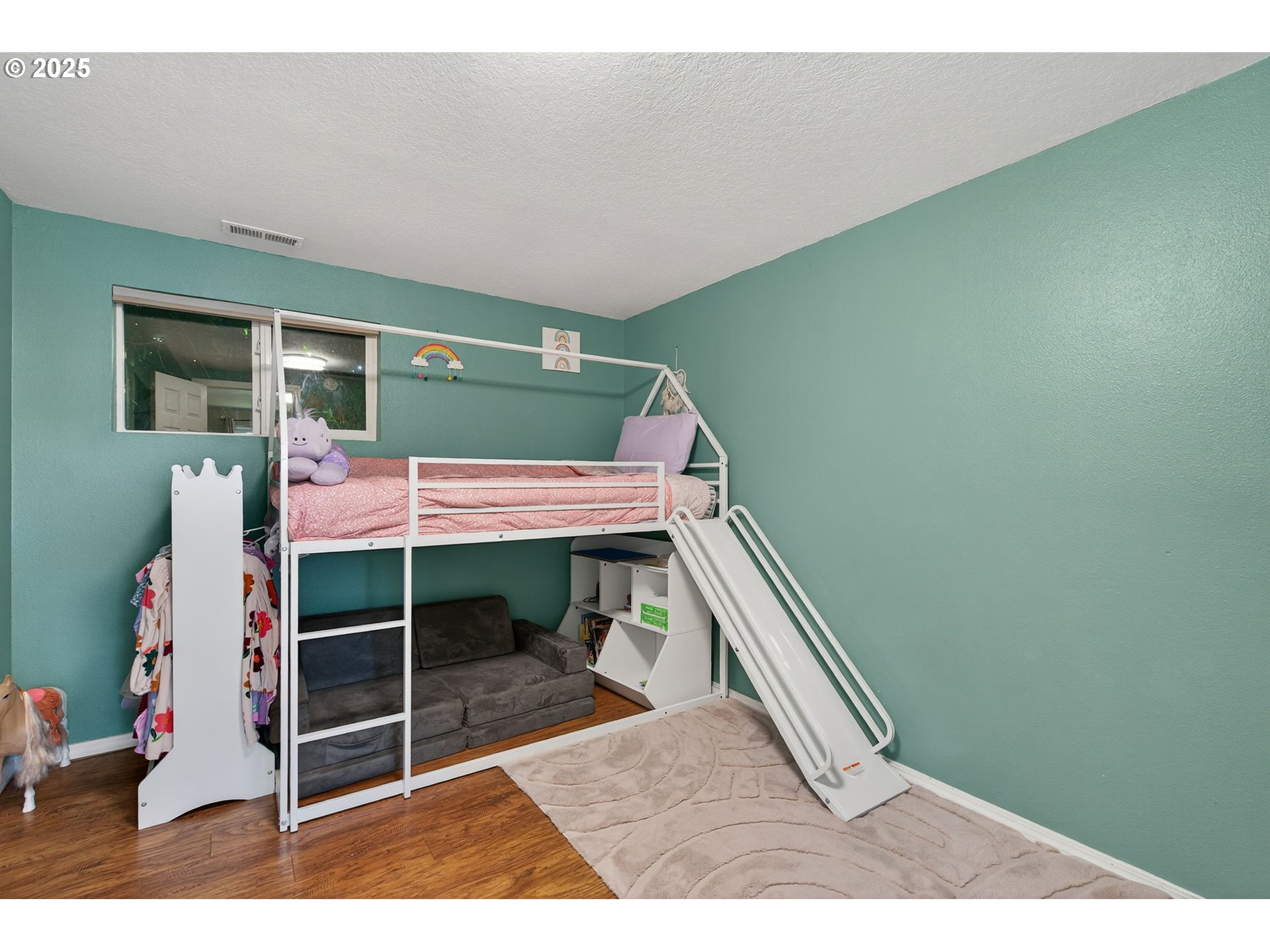 500 North Main Street Newberg, OR 97132 - Photo 16 of 23 a bedroom with a bed and a window
