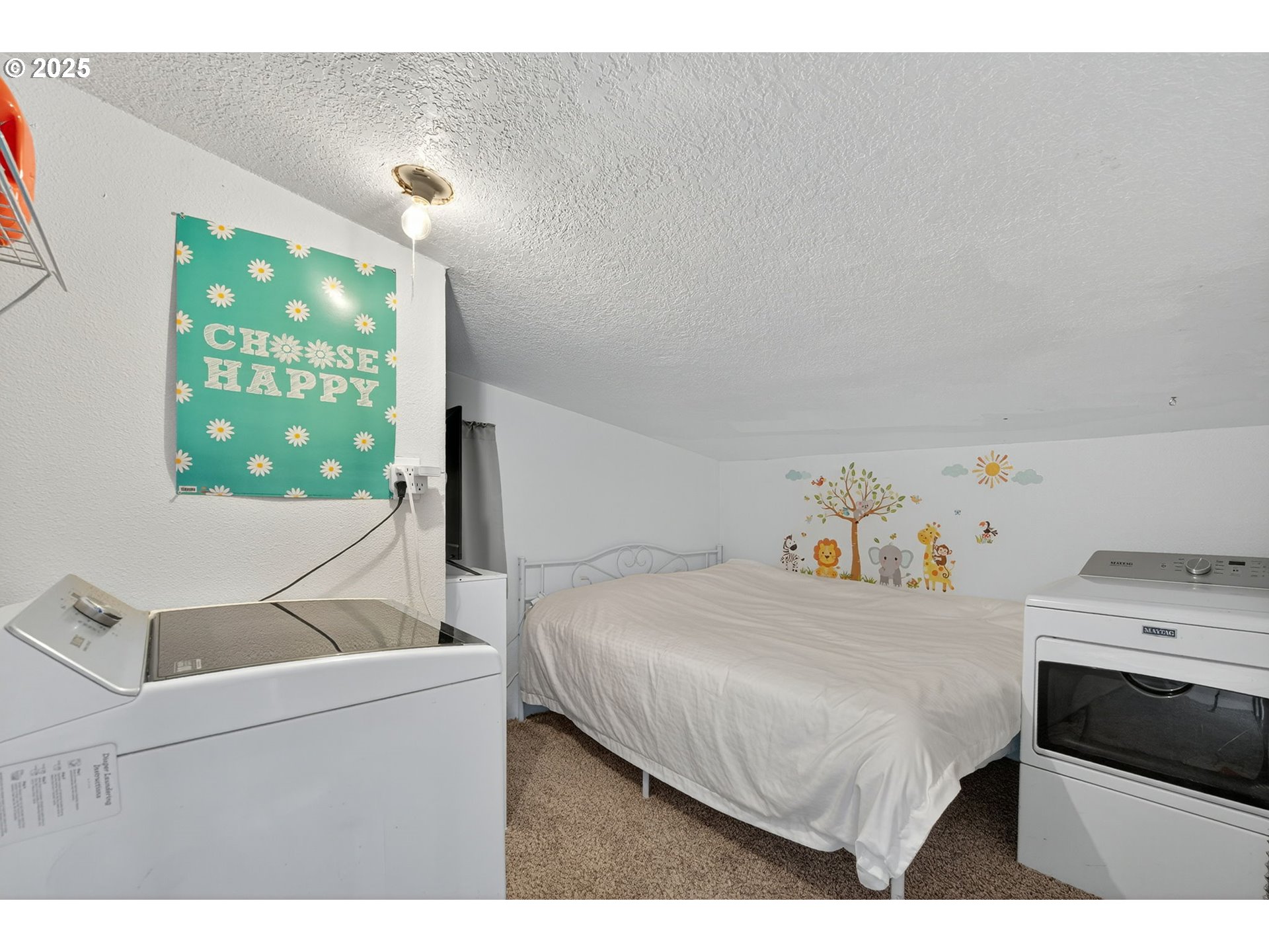 500 North Main Street Newberg, OR 97132 - Photo 17 of 23 a bedroom with a bed and a window