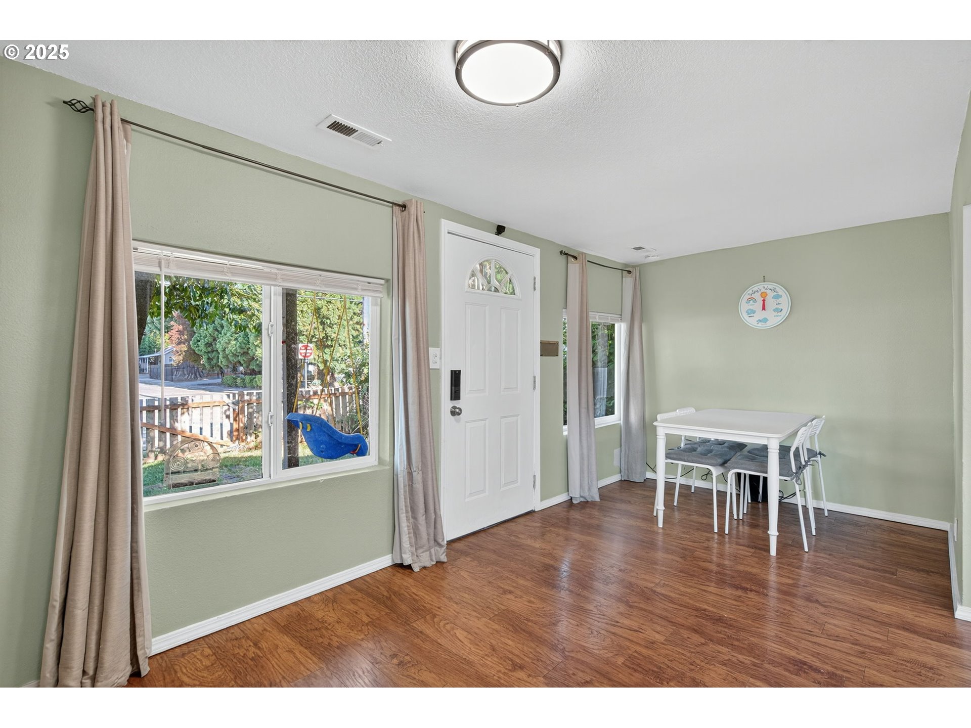 500 North Main Street Newberg, OR 97132 - Photo 2 of 23 a view of a room with wooden floor lounge chair and windows