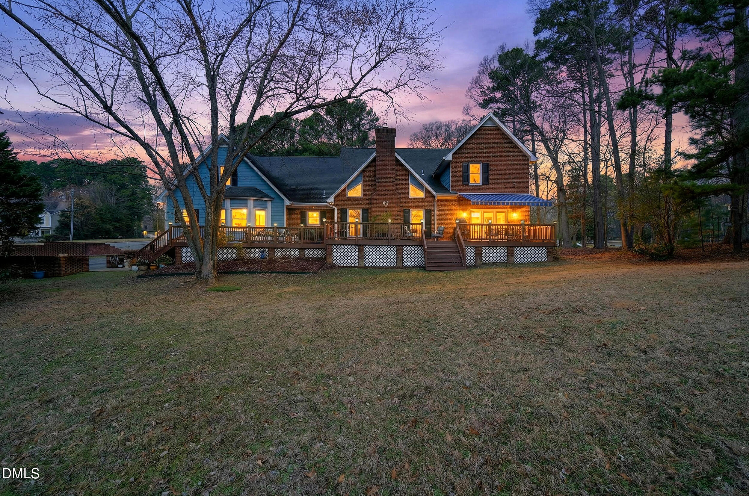 3735 Stoneybrook Drive Durham, NC 27705 - Photo 32 of 41 a front view of a house with a yard and garage