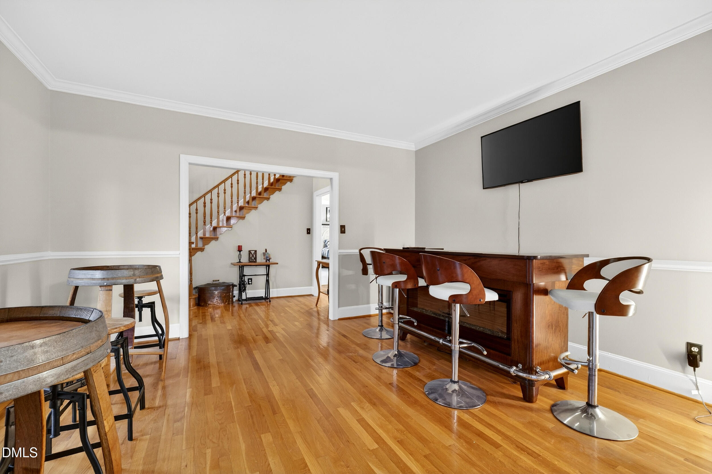 3735 Stoneybrook Drive Durham, NC 27705 - Photo 5 of 41 a living room with furniture and a flat screen tv