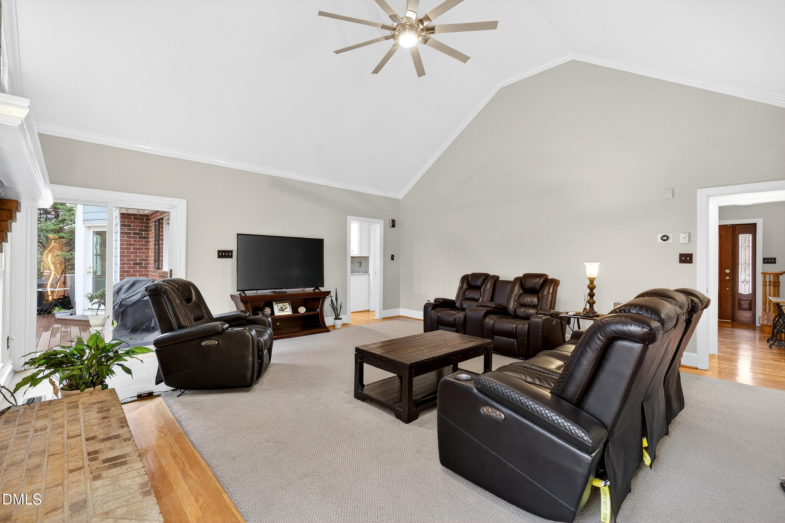 3735 Stoneybrook Drive Durham, NC 27705 - Photo 8 of 41 a living room with furniture and a flat screen tv
