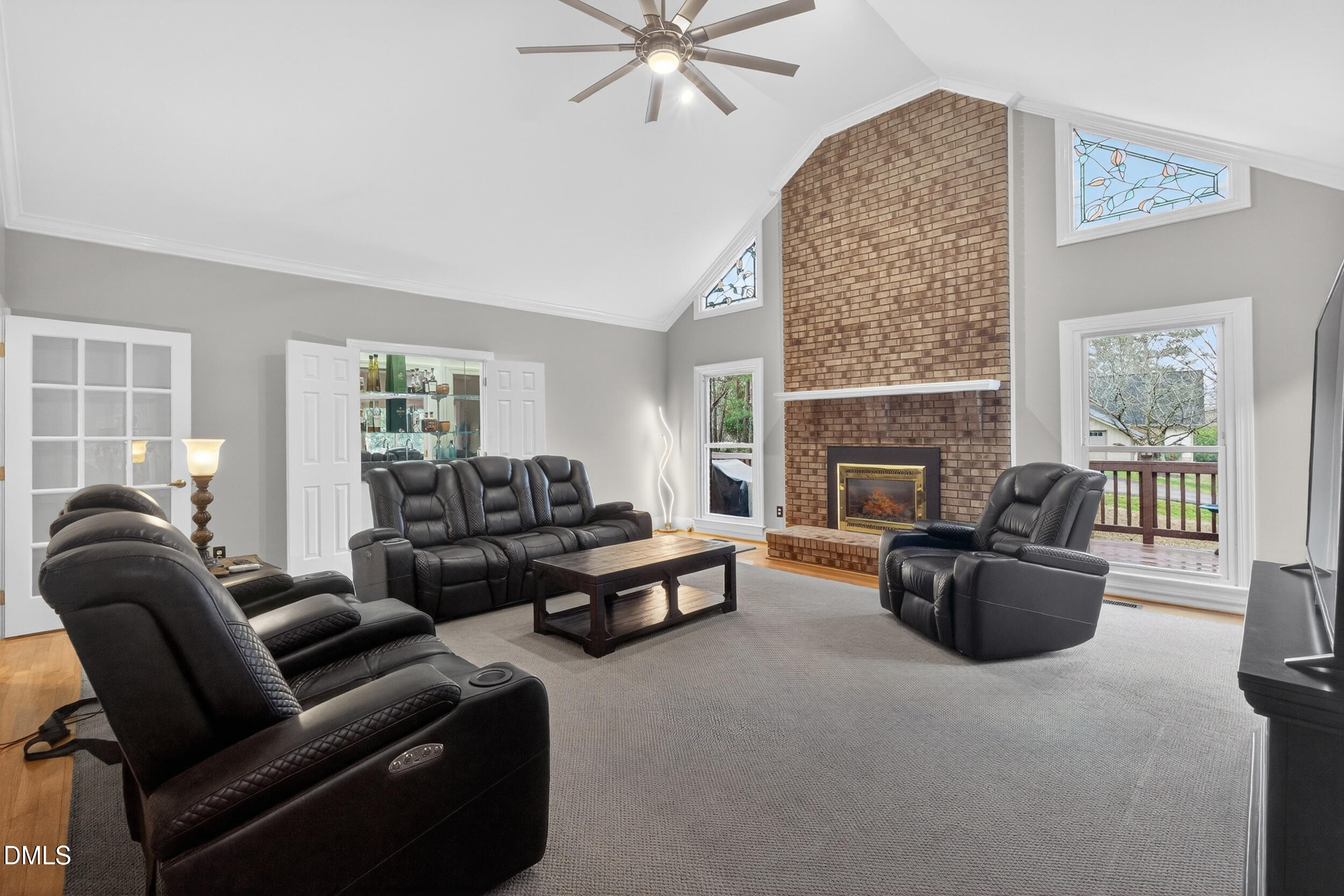 3735 Stoneybrook Drive Durham, NC 27705 - Photo 9 of 41 a living room with furniture and a fireplace