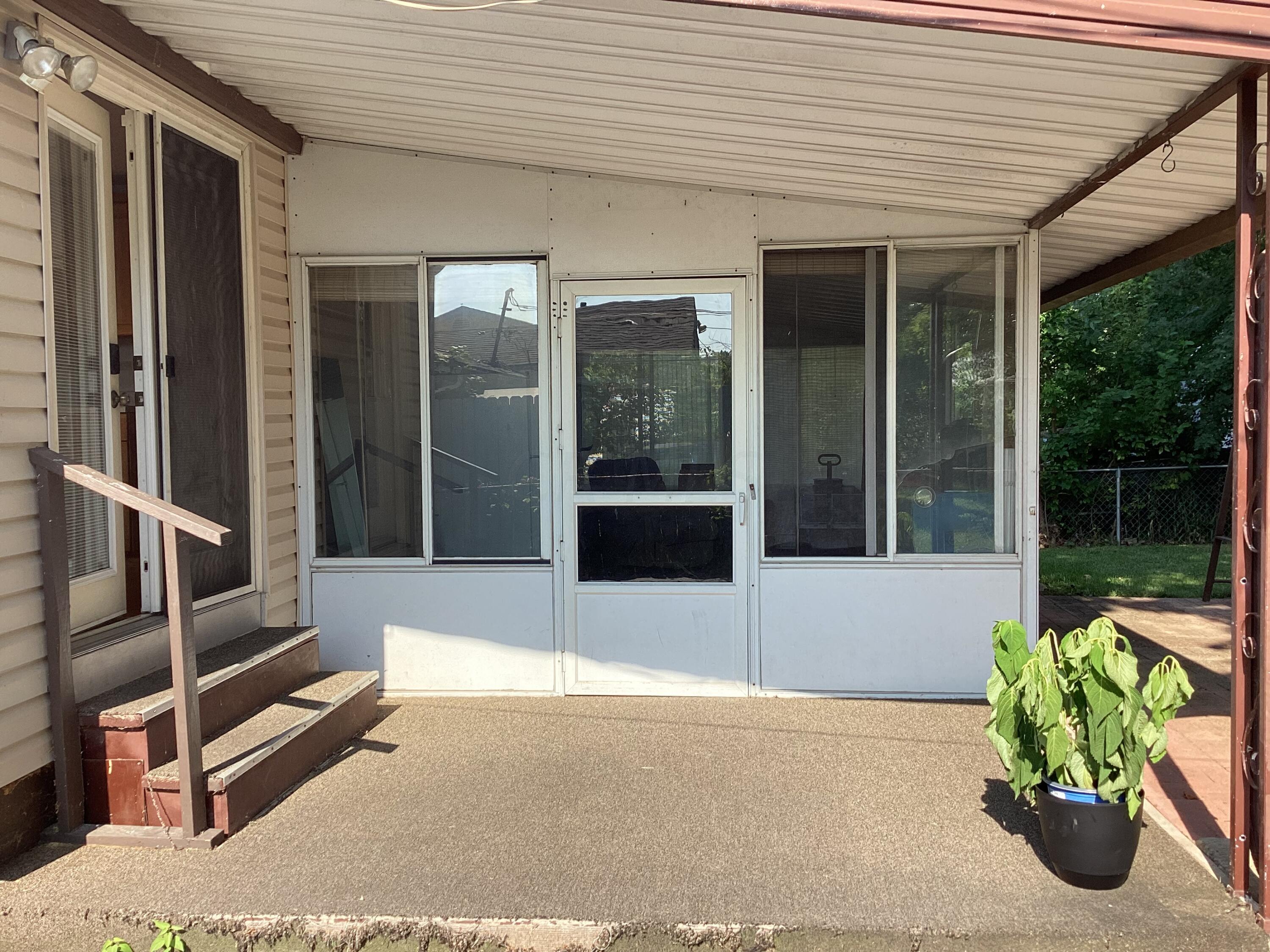 3984 Lynward Road Columbus, OH 43228 - Photo 33 of 34 Rear door to patio