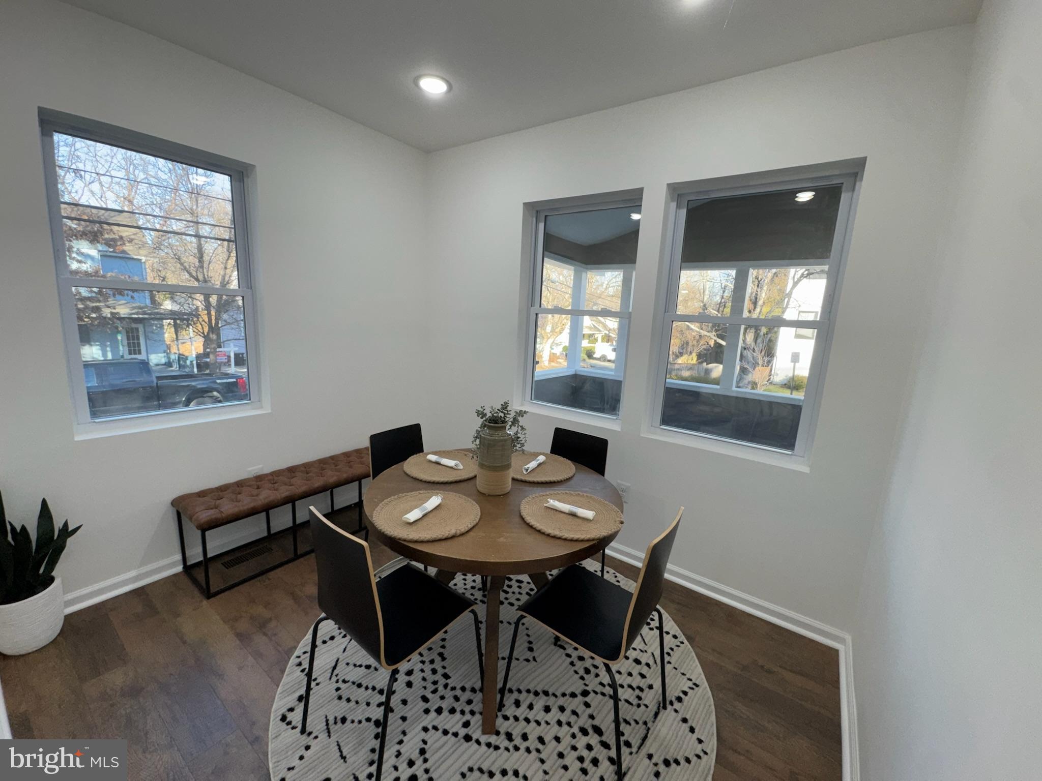 4116 32nd Street Mount Rainier, MD 20712 - Photo 17 of 51 a view of a dining room with furniture and window