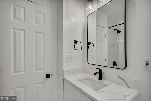 a bathroom with a sink and a toilet