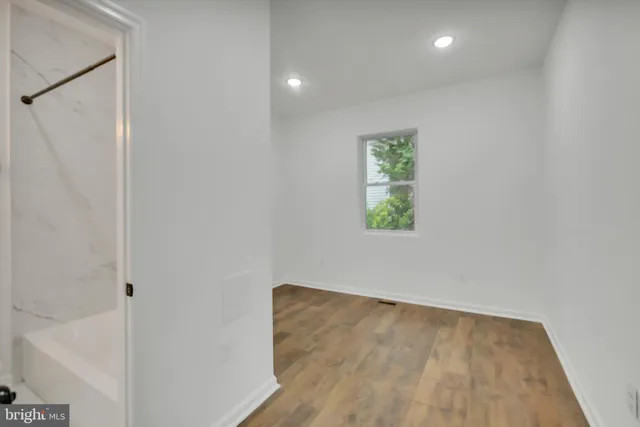 a view of a room that has a window