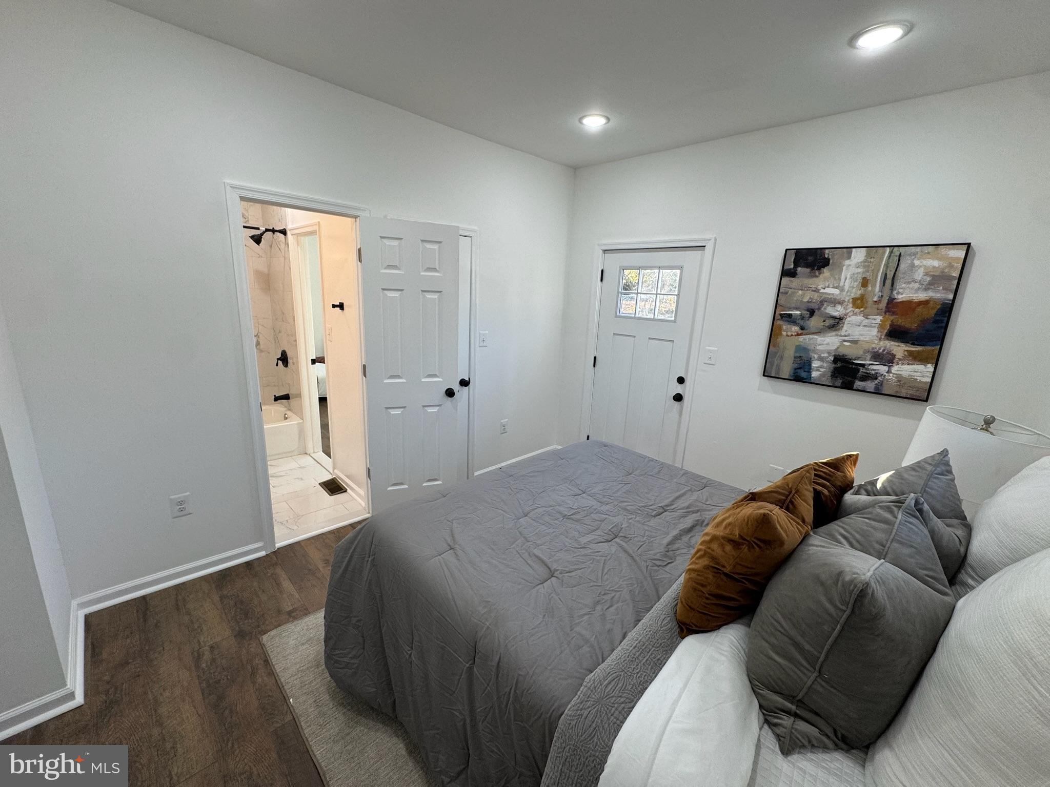 4116 32nd Street Mount Rainier, MD 20712 - Photo 28 of 51 a bed room with a bed and a couch