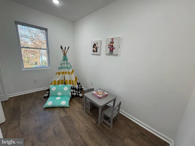 a room with furniture and window